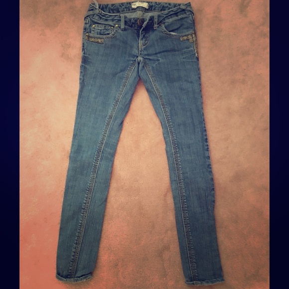 Skinny free people jeans with studs on pocket
