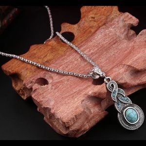 Turquoise bohemian style infinity twist necklace