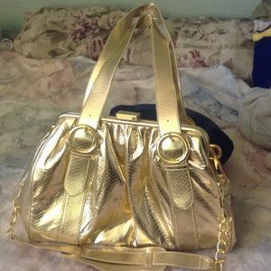Brand new , gold  , handbag
