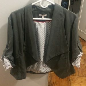 Grey blazer with black polka dot lining