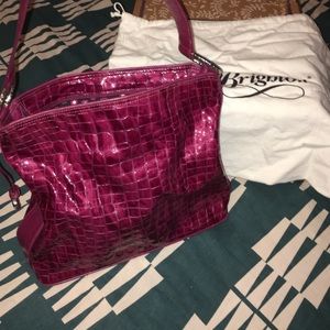 Brighton purse authentic has # & script in leather