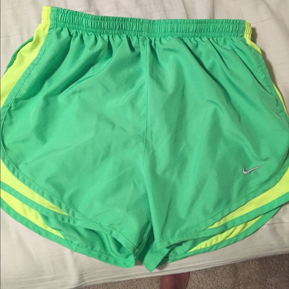 Lime green Nike running shorts