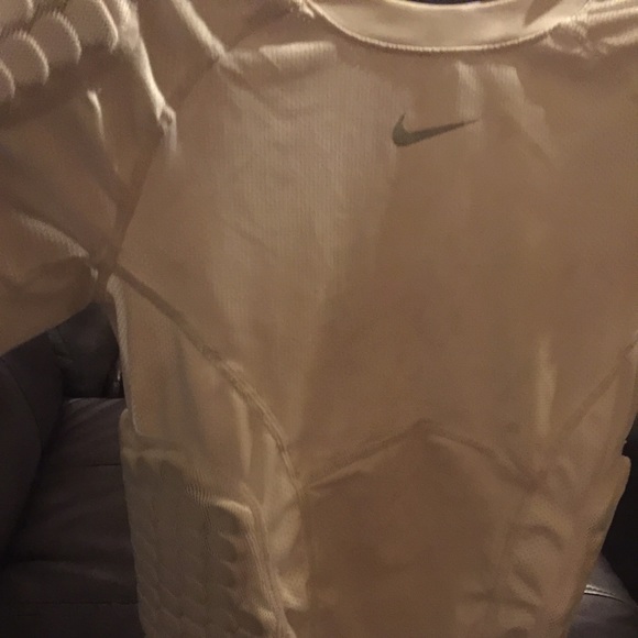 Boys Nike padded pro combat football shirt.