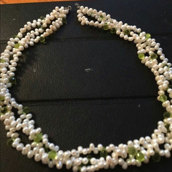 Fresh water pearls/Emeralds tear drops.