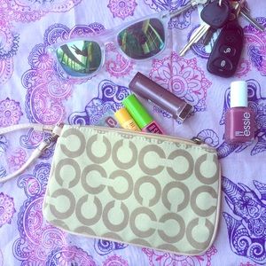 DONATING TOMORROW Coach Wristlet