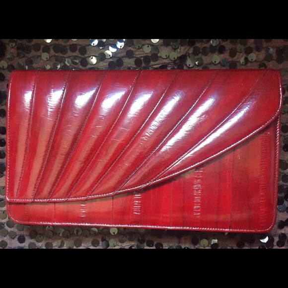 Vintage genuine eel skin clutch. Suede Interior.