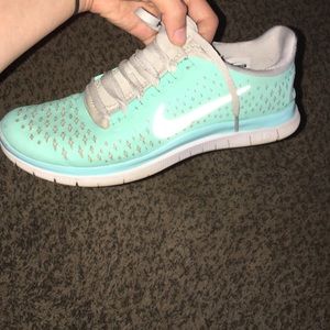 Aqua-turquoise Nike Tennis shoes