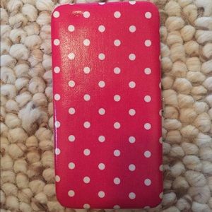Pink and white polka dot clutch wallet
