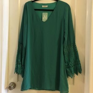 Emerald boutique dress with crochet sleeves