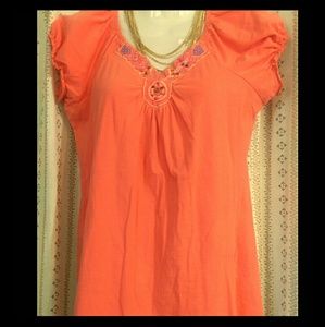 Coral tee with beaded neckline
