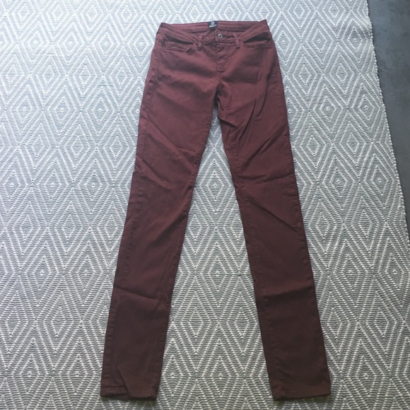 Stretchy maroon skinny jeans