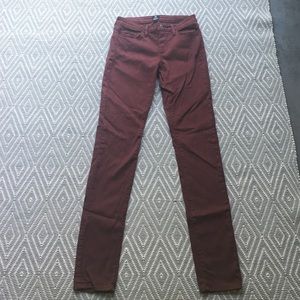 Stretchy maroon skinny jeans