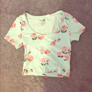 Teal colored floral cropped top