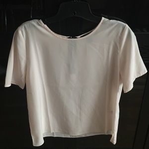 A sheer material pink blouse