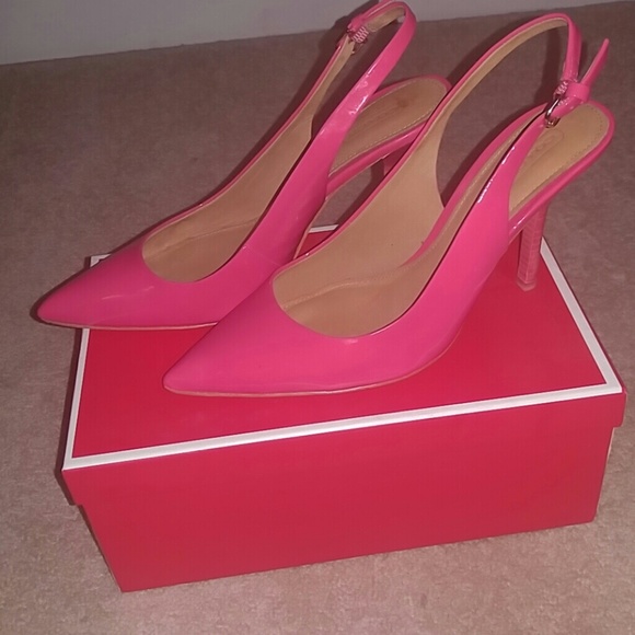 Coach along back pumps