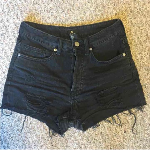 black ripped shorts