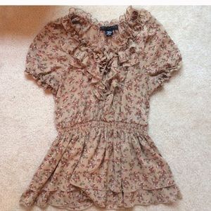 Floral Blouse with Ruffles and Tie Neck.