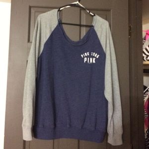 Off the shoulder PINK sweat shirt.