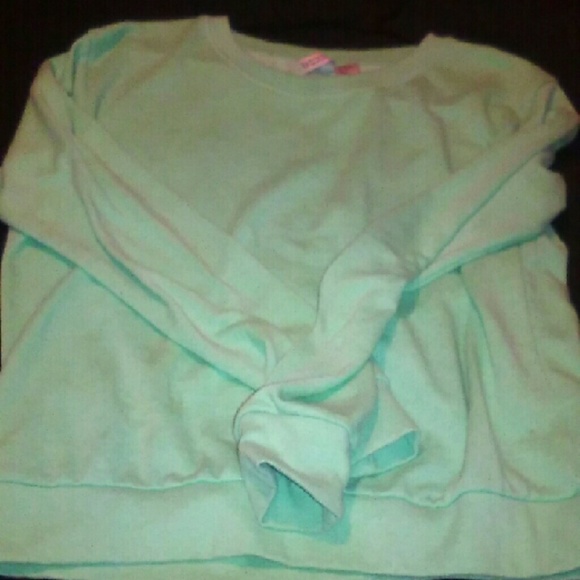 Mint green sweater.