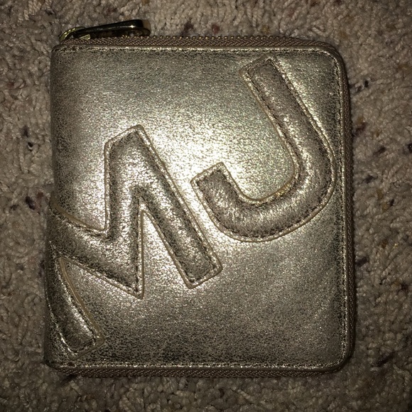 Marc by Marc Jacobs gold wallet.