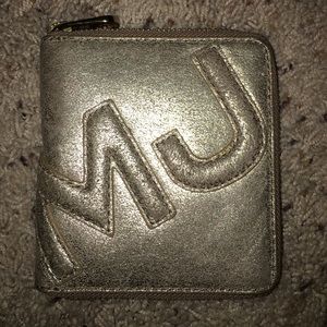 Marc by Marc Jacobs gold wallet.