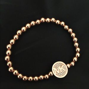 Rose gold Michael Kors elastic bracelet