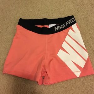 Pink/coral Nike Pro spandex shorts Medium
