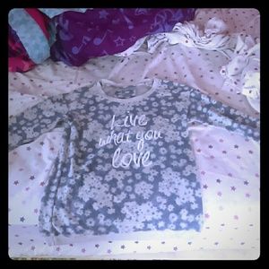 A navy floral quoted shirt