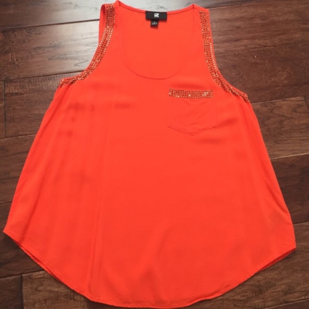 Bright orange top
