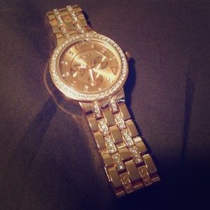 Brand new rose gold watch with diamond accents