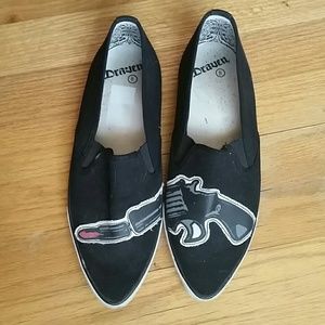 Black Canvas lipstick gun slip-on skimmers