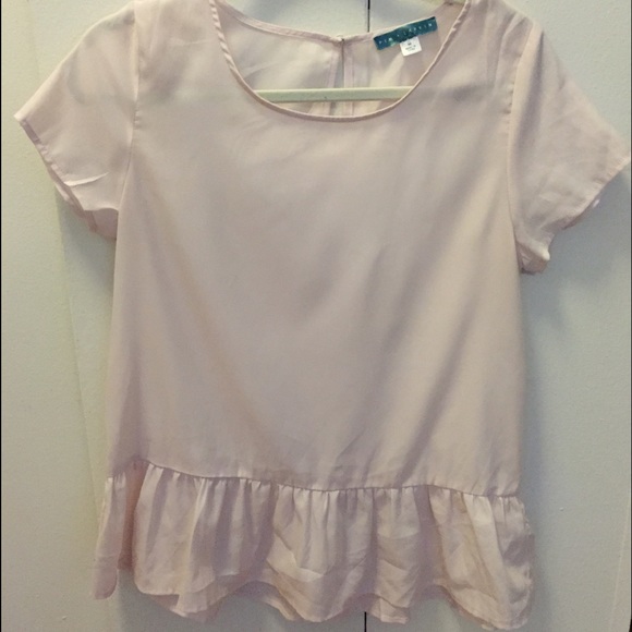 Pastel pink semi-sheer top with ruffle detail