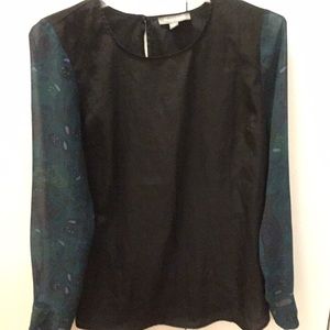 Black long sleeved top with paisley sleeve print