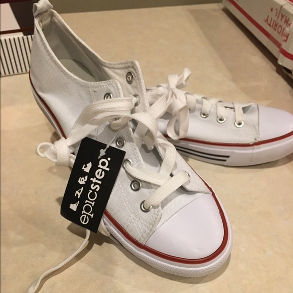 White converse-style sneakers