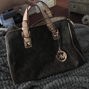 Michael Kors bag with some minor wear and tear