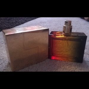 Large bottle of L - LAMB perfume by Gwen Stefani