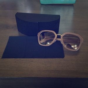 Purple Prada sunglasses