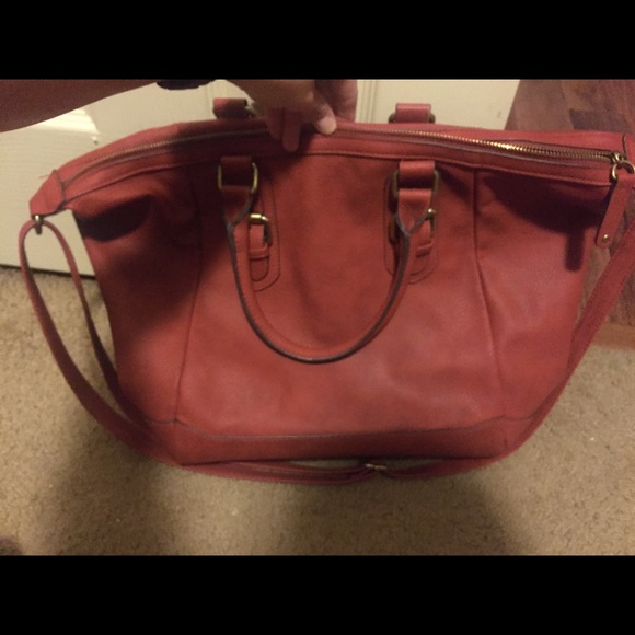 Rust color leather handbag