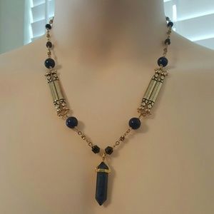Lapis lazuli and gold colored necklace