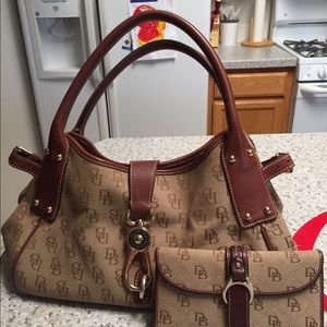 Dooney & Burke bag with matching wallet. Pre-owned