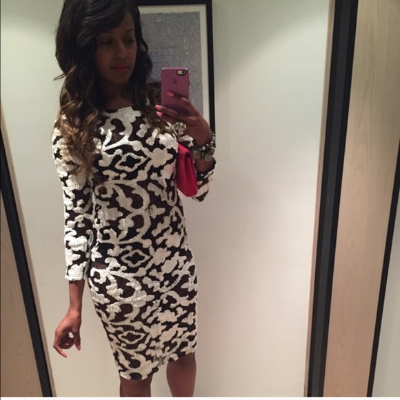 Form fitting black and white dress ..