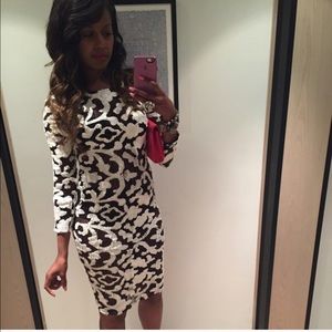 Form fitting black and white dress ..