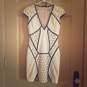 White dress with black and nude details