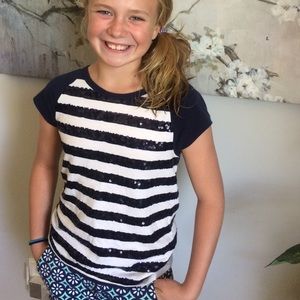 Festive navy and white striped tee.