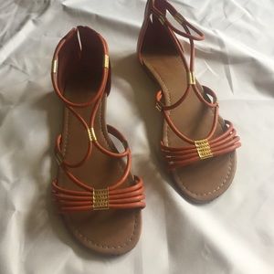 Orange and gold sandals