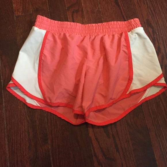 Pink and white athletic shorts