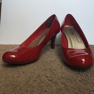 Patent red pumps