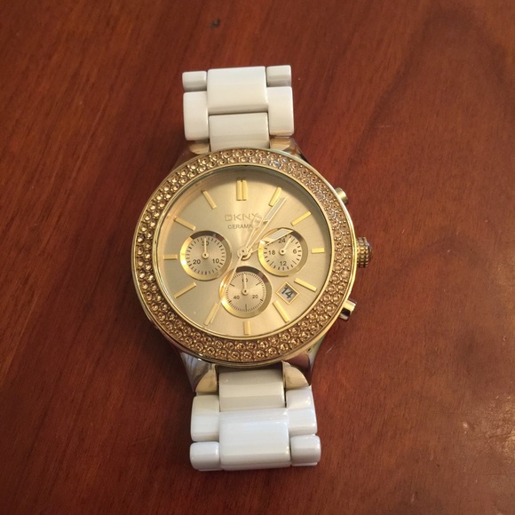 DKNY white and gold watch