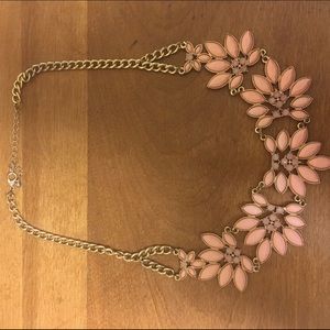 Pink and gold colored necklace