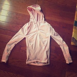 Pink nylon hoodie. Very fitted.